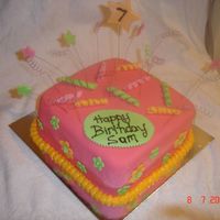 My First Bright And Bold Cake Chocolate cake with Strawberry BC then fondant, all the decorations are fondant and my first go with the wire!