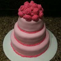 Pink On Pink My first 3-tier cake. It didn't end up quite as I'd hoped. Yellow cake iced in buttercream, covered in fondant, buttercream trim...