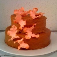 Butterflies On Mocha Fudge cake, coffee buttercream frosting, sugar butterflies.