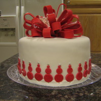 Blushing Snowmen!! Marble & vanilla cake with Fudge brownie filling, butter cream, and fondant. Three double layer 10" cakes.