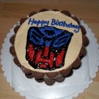 Transformers Birthday Cake Transformer's Logo on Dark Chocolate cake with Peanut Butter ButterCream