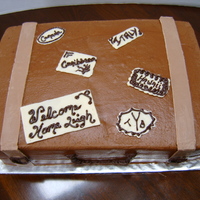Suitecase Cake Chocolate Sour cream pound cake, raspberry filling, and chocolate buttercream. Candy melts were used for the travel stickers, straps,...