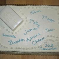 First Communion Cake 1/2 sheet cake - 1/2 chocolate 1/2 white w/ fresh strawberry cream filling. Bible and Rosary are made out of fondant, everything else is BC...