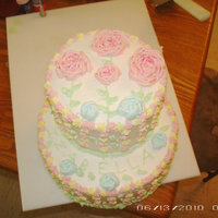 3Yr Olds Bday Cake A standard white cake, dyed pink. Torted and filled with vanilla buttercreme. Iced and decorated with vanilla buttercreme.