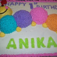 Baby Einstein Caterpillar Cake Many thanks to the others on C/C for the cute idea for this cake. The colors matched those on the invitations, plates, and napkins. The...