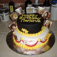 High School Musical I made this cake for my nieces birthday, it was very challenging since I had never covered a cake in fondant, but thanks to all the help on...