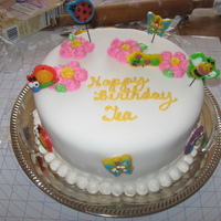 Tea's Birthday Cake I baked this cake for my granddughter, Teaghan's first birthday. I had never worked with fondant before. Mom wanted to have "bugs...