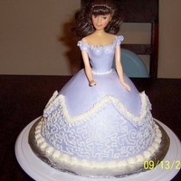 Princess Cake Made with a wondermold pan and covered with satin ice and buttercream. Thanks for looking.