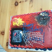 Marvel Heros child help do the webbing, she is learning how to do cakes.