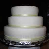 Wedding Cake 4/3/10 8", 10" and 12" ~ 3" vanilla rounds, buttercream and mmf.