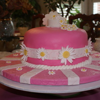 Kentucky Derby Cake My first hat cake. It took forever to make all of the daisies for this cake, but the effort paid off. I wish I could have kept the "...