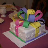 Gift Box Cake The very first cake that I made for money. Naturally, I was so excited about having someone asking me to make them a cake for a function...