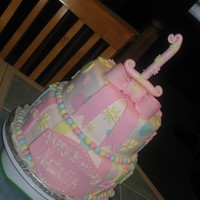 Baby's First Birthday two tier, eight and ten inch cake ...chocolate and vanilla. both tiers are covered in fondant.