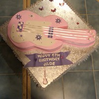 Pink Guitar Guitar cake for 6 year old.
