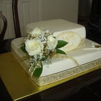 50Th Wedding Anniversary MMF, White cake filled with rasberry preserves. This cake is for my clients parents who love golf so I addes small golf accents...TFL!