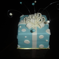 Present Cake Lemon cake with white chocolate MMF. TFL!