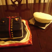 Marine Cake I made this for a friends brother in-law who leaving back to the Marine's. It's a chocolate kahluah fudge cake filled with...