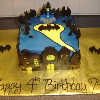 Batman Cake This was fun to make...not perfect but fun for sure! Vanilla BC with fondant accents. Cake is Yellow but mixed it up a bit and made half...