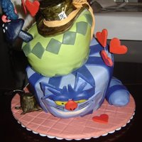 Alice In Wonderland I made this cake for my baby boy. He loved the new Tim Burton movie so this is what I came up with. I was inspired by other cakes on CC....