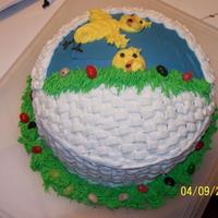 Easter 2009 This was actually a pretty easy cake one I got the hang of basket weaving...lol (date on pic is wrong)