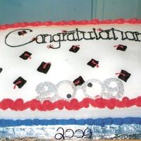 Graduation Cakes This was done for our Homeschool Banquet this year. All buttercream icing with a pair of 2009 Glasses that i took the arms off of and made...