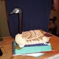 Canadian Goose Made with yellow cake, butter cream icing, and chocolate fondant head, neck, and feathers. Whataya think. This is my first animal cake.