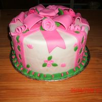 Wilton Cake Class 3- 1 St Cake I used foam cakes. Covered with Wilton fondant and the Wilton Ribbon doubled. I used the ribbon cutter and the punch out tool to do the...