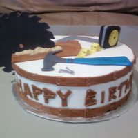 Carpenter's Cake Cookies and cream cake. All the decorations were made with fondant.