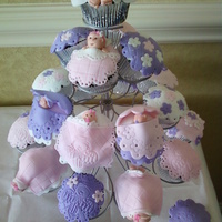 Baby Shower Cupcakes Chocolate cupcakes, covered with fondant. Babies are also made with fondant. TFL!!