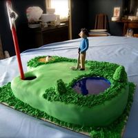 Golf Cake This is a chocolate cake with vanilla butter cream frosting. Its covered with fondant and I used sanding sugar for the sand trap and corn...