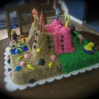 Princess/sand Castle Cake This is a chocolate cake with vanilla butter cream filling in the castle and chocolate ganache filling in sheet cake portion. I made this...