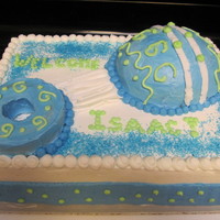 Baby Shower Rattle Cake Made this for my friends baby shower. I just made a WASC with buttercream. Used half of the wilton sports pan for the rattle and I had a...