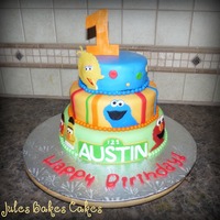 Sesame Street This design is by Pastrychic on Flickr, I just loved it when I saw it..her version is much neater than mine.Bottom tier: Banana cake with...