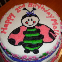 Ladybug Made to match the ladybug party theme - ladybug is a combo of buttercream w/ a royal icing face (and glittery cheeks!) flowers are all...