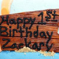 Octopus This was for an under the sea birthday party - vanilla cake with buttercream, octopus is rct covered in satin ice, characters are fondant...