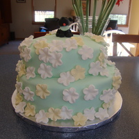 Baby Shower Really fun baby shower cake I made for my cousin - yellow cake with chocolate buttercream filling covered in satin ice fondant. Thanks to...