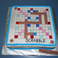 80Th Birthday Scrabble Cake 80th birthday scrabble cake. 12" square cake covered with fondant. Tiles are made from fondant/gumapste.