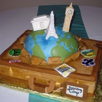 World Traveler All fondant covered with gumpaste buildings. I used royal icing for detail on the buildings. The buildings were all places the groom had...