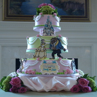 Wedding Shower Cake Three tier all buttercream. Beauty and the Beast characters are made out of chocolate. Fondant roses.