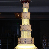 Bling Bling Bling This 12ft tall cake, iced in all buttercream, had over 75 yards of swarovski rhinestones, almost 500 yards of crystal bead strands and tons...