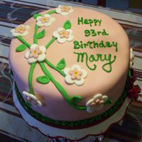 93Rd Birthday Chocolate cake covered with pink fondant and fondant flowers.