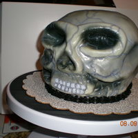 Skull Cake this was actually a birthday cake that I made for my sister's 18th birthday. It's chocolate cake (about 5 layers) with chocolate...