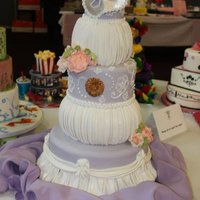 Garden State Cake Show. Quick description: sugar flowers, pleats, swags, brooch, rice paper feathers, sugar mask, brush embroidery.... Was that quick?? :)