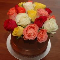 Fresh Roses Chocolate cake, cherry and cream filling and fresh flowers on top! First time cake with fresh flowers.