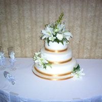 Wedding Cake 3 Tiers, 16" chocolate, 10" vanilla almond, and 6" marble. Chocolate and Marble tier filled with Chocolate Custard Filling,...