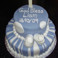 Baby Boy Baptism Marble cake, buttercream frosting, fondant covered, fondant booties, white chocolate cross