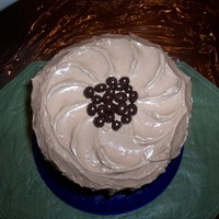 Coffee Cake With A Coffee Mocha Butteer Cream Coffee Cake with a brown sugar walnut struesel. Topped with a french vanilla cake crumb and frosted with a coffee butter cream with a hint...