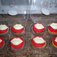 Valentine Lips Cupcakes Fudge Swirl Cupcakes with white chocolate lips. Vanilla whipped icing. Last minute throw together cupcakes for a 5th grade valentine party...