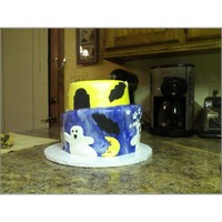 Halloween Topsy Turvy This was my first Topsy Turvy Cake. It almost ended up a complete disaster because someone froze my cake and the fondant began to peel off...