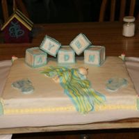 Baby Boy Baby Shower This is my 5th (I think) all fondant cake with exception of the border. My first time doing mini cakes. The blocks are cake. The fondant is...